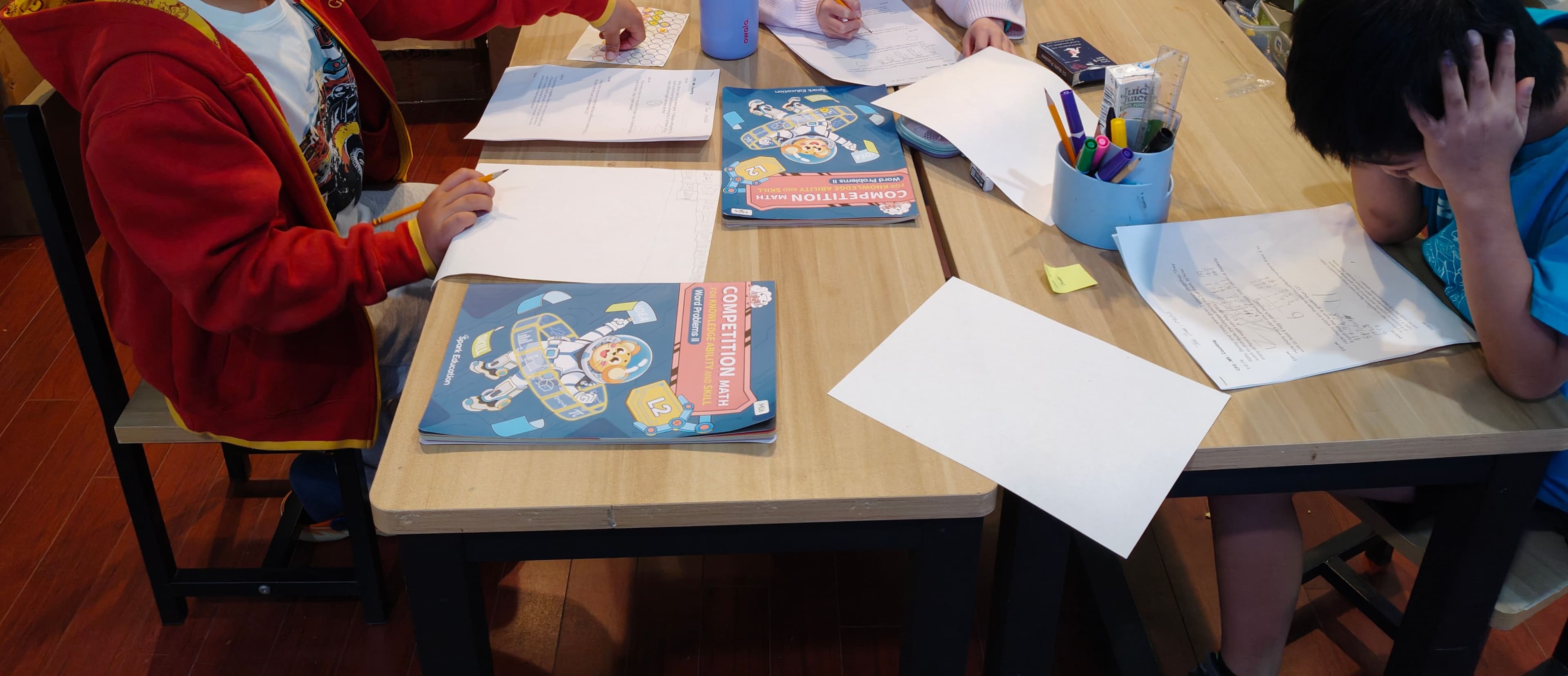 MGA students working through a Noetic Learning Math Contest–style problem